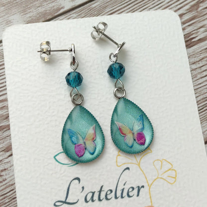 Boucles d'oreilles goutte papillon vert pastel en résine nacrée et acier inoxydable argenté
