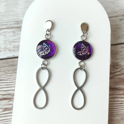 Boucles d'Oreilles Papillon Magique – Violet & Acier Inox L'Atelier VanessaCréa
