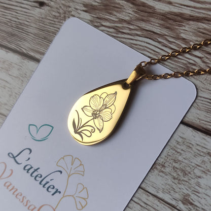 Collier orchidée personnalisé avec pendentif goutte en acier inoxydable poli miroir et gravure laser de précision.
