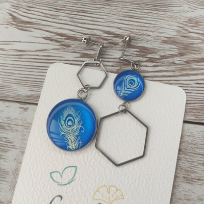 Éclat Céleste – Boucles d'Oreilles regan Plume aux Reflets Changeants