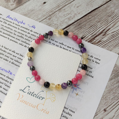 Bracelet chemin de vie personnalisé en pierres naturelles multicolores selon la numérologie du client.