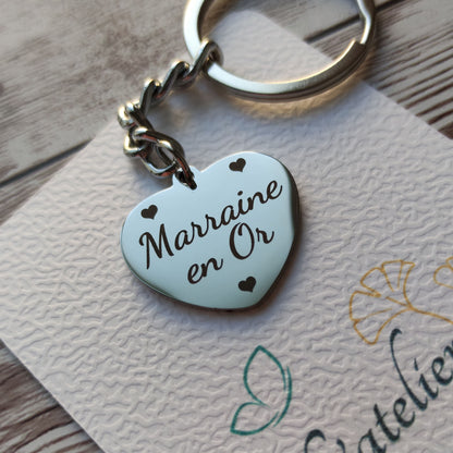 Porte-clés en forme de cœur acier inoxydable poli miroir gravé Marraine en Or avec trois petits cœurs.
